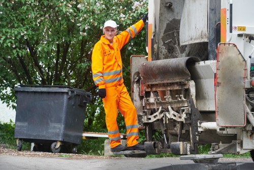 Professional garden waste removal service in action